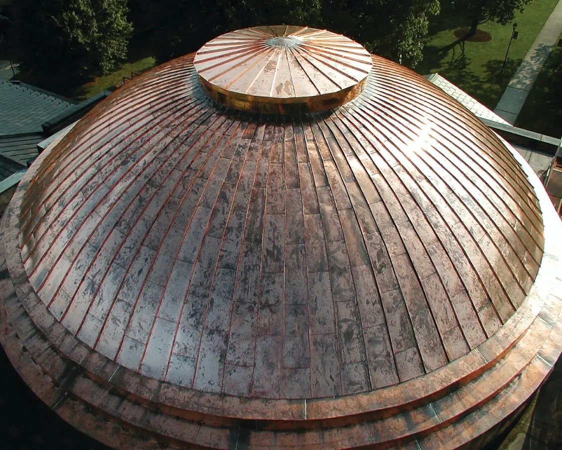 Craftsman Roofing crew installing a new roof in Northeast Heights